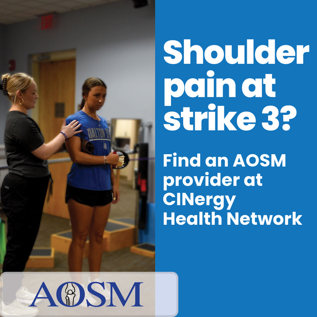 physical therapist working with patient